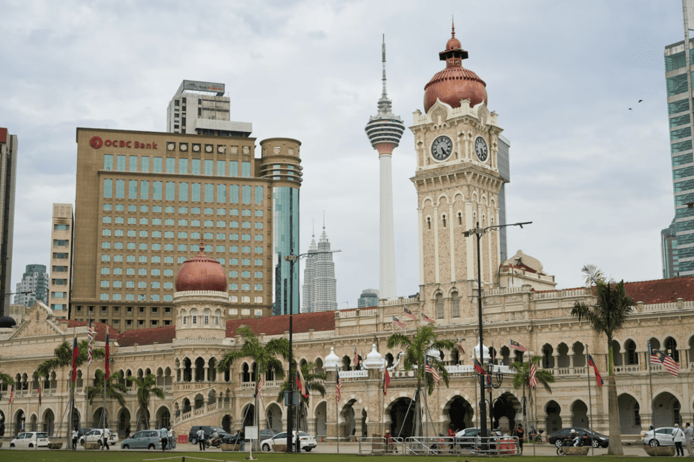 Tourist destinations with ancient architecture reflecting traditional Malaysian style https://www.freepik.com/free-photo/building-city-with-cloudy-sky_1014112.htm#fromView=search&page=1&position=5&uuid=8cb8e6dc-10d4-41fe-8760-d5ed575d08f4&query=malaysia